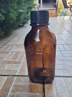Large amber medicine bottle.