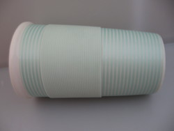 Porcelain cup green and white, with silicone cuff