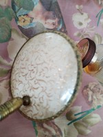 Hand-held cosmetic mirror - in an antique atmosphere