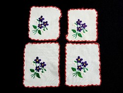 4 rectangular tablecloths embroidered with a violet flower pattern in the picture