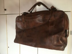 Old large brown travel bag