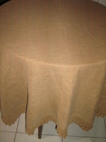 Beautiful brown hand crocheted woven tablecloth with a lace edge