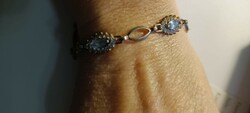 Finely crafted zirconia silver bracelet with a blue shade