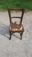 Antique children's thonet chair is defective.