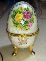 Beautiful flower-patterned mother-of-pearl porcelain jewelry box in the shape of an egg