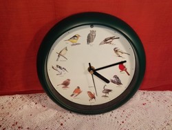 Wall clock with bird singing...