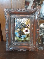 Old Dutch floral, butterfly fire enamel marked picture, in a wooden frame.