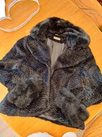 Black, short, synthetic fur, used.