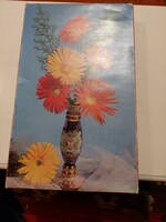 Sweet box with gerbera flowers in the vase