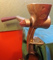 Poppy grinder /marked aluminum casting/