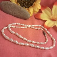 Old cultured pearl necklace.