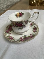 A dreamy English rose tea cup with small plate.