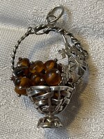 Beautiful silver basket with amber quills inside.