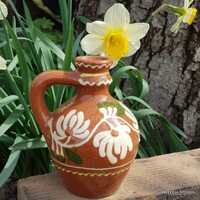 Folk ceramic pitcher jug