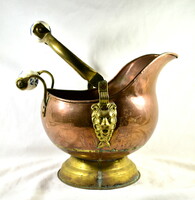 Full-bodied copper pot with lion head decoration and porcelain handle