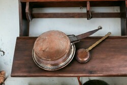 Antique copper pan and copper ladle