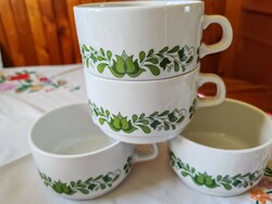 Lowland tea cup with a green folk motif