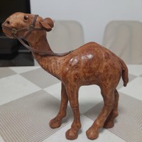 Hand-carved, leather-covered camel statue