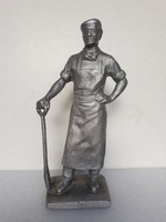 Old socialist metal worker metal statue