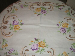 Beautiful pink hand-embroidered cross-stitch tablecloth
