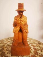Piper Székely carved wooden statue