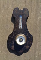 Barometer and thermometer on wooden flower decorated base