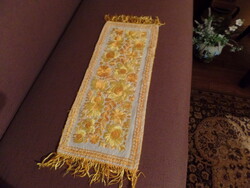 Table runner with embroidery and fringe