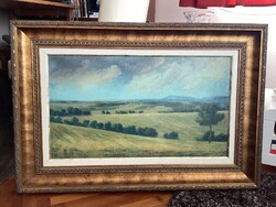 Landscape, in a wide gold frame.