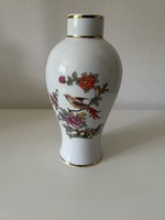 Bird vase with raven house