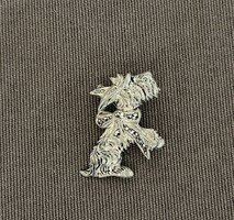 Silver dog brooch