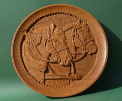 Representation of a horse carved into an oak disc horses horse portrait wood carving carved wall picture