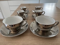 Shiny inox or silver porcelain coffee and tea cup + base