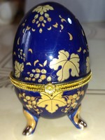Beautiful periwinkle and leaf pattern cobalt blue porcelain jewelry box in the shape of an egg