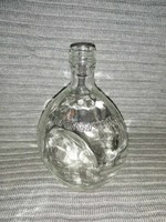 Glass bottle with the inscription Federal law forbids sale or reuse of this bottle (a4)