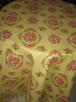 Beautiful yellow floral summer tablecloth with a cheerful atmosphere, new