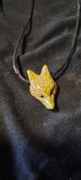 Beautiful unaki carved fox head pendant on black thread