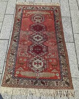 Antique hand-knotted Kazakh carpet is negotiable