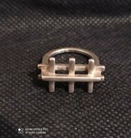 Silver ring with unusual head