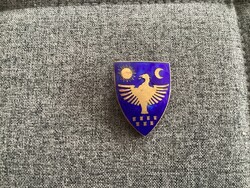 Cap badge depicting the coat of arms of Transylvania, cockade.