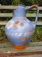 Antique folk jug in blue