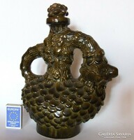 Beautiful, large, detailed figural glazed ceramic water bottle, pouring