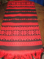 Beautiful black and red woven fringed tablecloth