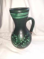 Green glazed goblet (wine jug) with a folk motif