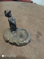Ashtray made of copper alloy, with a figurative sculpture