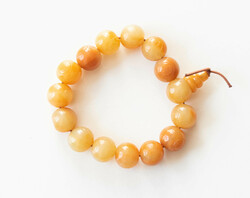 Last option - Buddhist mala bracelet - orange jade imitation made of plastic
