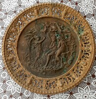Beautiful bronze wall plate with relief center from the 19th century 