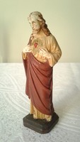 Antique heart of Jesus statue
