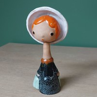 Extremely rare industrial art figurine of a girl in a hat with a moving head