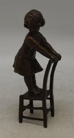 Little girl on a chair bronze statue (780)