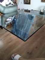 A 90cm*90cm thick tempered glass plate lying on a real marble plinth